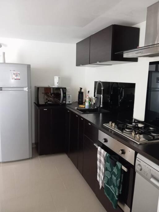 Appartement Cosy Avec Jardin Vaux-Sur-Seine Bagian luar foto